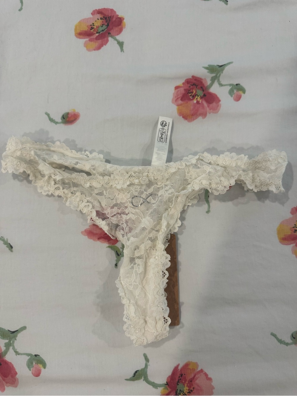 SKIMS Cream Lace Thong Panty